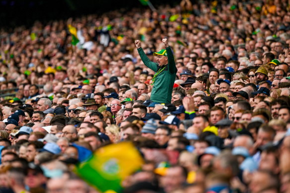 A Kerry supporter cheers on his side during the GAA Football All-Ireland Senior Championship final match against Dublin .