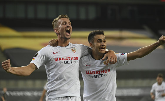 Luuk de Jong, left, celebrates after putting Sevilla into a fourth Europa League final in seven years.