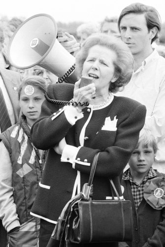 Prime Minister Margaret Thatcher with her handbag.