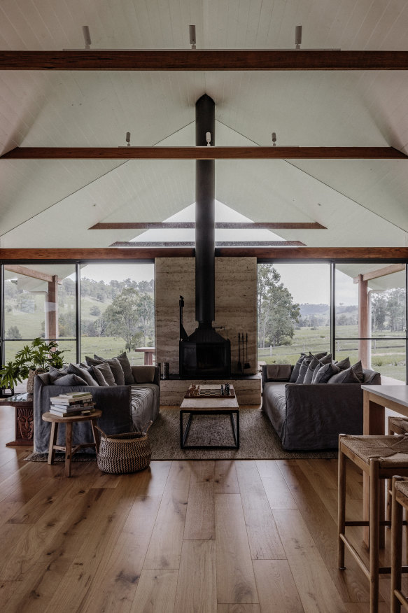 At Wallaringa Farm, large-scale finishes such as blackbutt floors and a rammed-earth fireplace are echoed in small details – hardwood logs for the fire, a professional-level coffee machine and several very sharp knives.