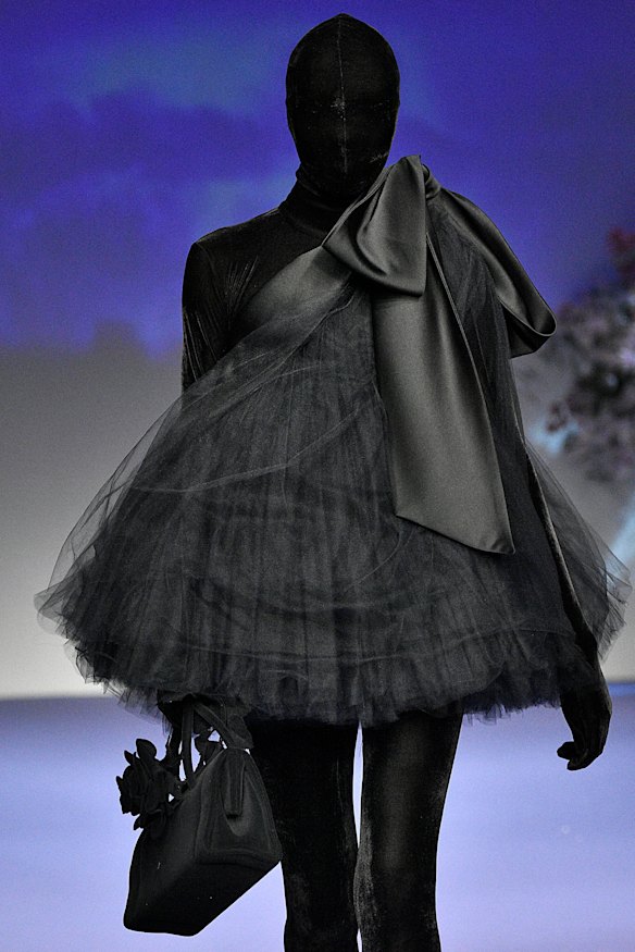 A model walks the runway at the Richard Quinn Ready to Wear Spring/Summer 2019 fashion show.