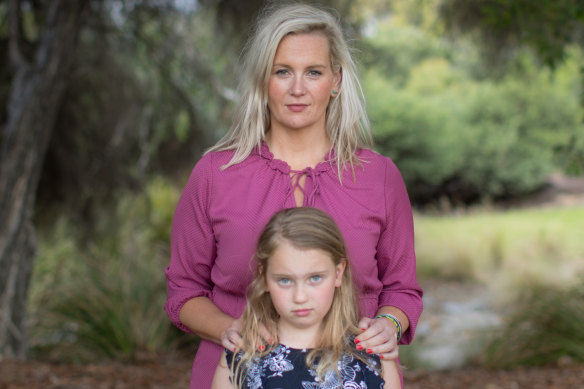 Poppy with her mother, Erin Carson, who says, "Seeing my daughter lying lifeless in a hospital bed is something I’ll remember for the rest of my life."