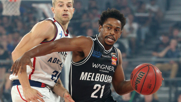 Casper Ware gets past Adelaide's Nathan Sobey.