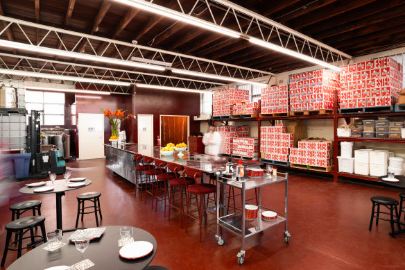 The long marble table is a focal point of Ester’s tasting room.