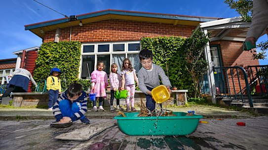 Children playing at Gardiner Preschool, which faces closure at the end of next year.