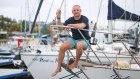 Tom Neville aboard his yacht Postremo at Brisbane East Coast Marina.