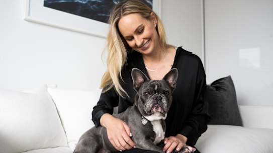 Shae Robbins French Bulldog, Flex, wearing a $200 topaz pendant.