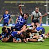 Carlo Tizzano celebrates one of his two tries.