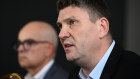 Hawthorn boss Justin Reeves facing the media on Wednesday after a bombshell racism scandal reported by the ABC. 
