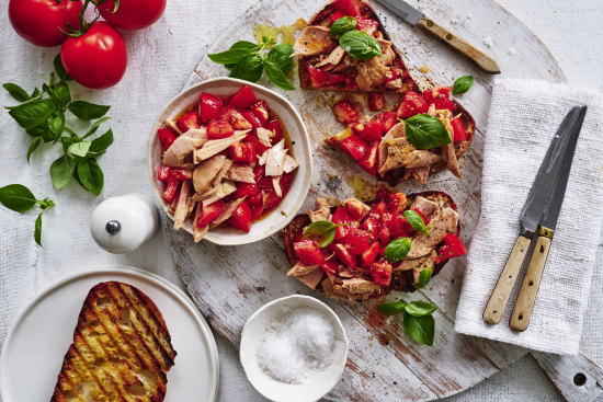 Budget-friendly bruschetta topped with tuna and tomato.