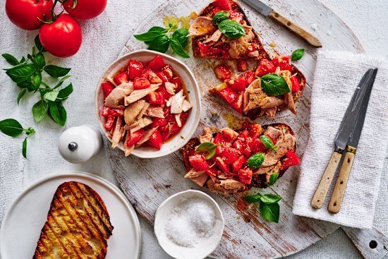 Budget-friendly bruschetta topped with tuna and tomato.