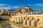 The Roman Bridge across the Guadalquivir river and the marvellous Mosque-Cathedral in Cordoba, Spain.