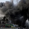A building in Bachoura District in central Beirut is hit by an Israeli air strike.