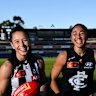 Inaugural AFLW players Darcy Vescio alongside Collingwood’s Brit Bonnici.