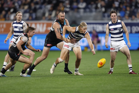 Cats rattled as red-hot Power pile on the goals in Hawkins’ milestone