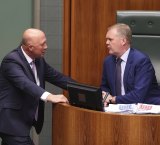 Defence Minister and Leader of the House Peter Dutton talks to Speaker Tony Smith during Question Time in May.