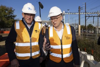 Hardhat bromance: Daniel Andrews (left) and Anthony Albanese at a level-crossing removal project in suburban Surrey Hills on Tuesday morning.