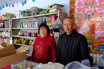 Hanzhuang villager Wang Zhenghai, 67, and his wife at their grocery shop.