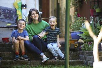 Bronwen Morgan with her two sons, Archie, 6, and Oscar, 4, on the day before school returns.