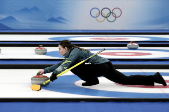 Tahli Gill throws a stone during Australia’s mixed doubles curling match against the United States on Wednesday night.