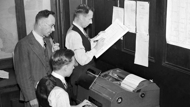 Staff from the weather bureau make recordings of high temperatures in Sydney on 12 January 1939 for the 3pm weather bulletin. Two days later they would record NSW's hottest day on record.