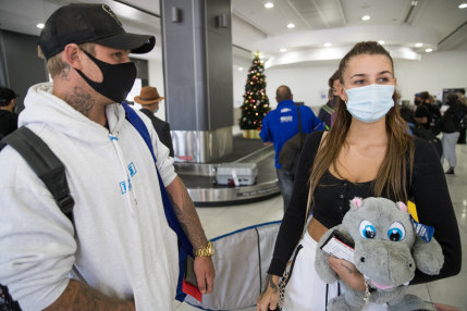 James Tomich and Stephanie Dugina arrived into Melbourne Airport on Saturday morning after spending time at the Gold Coast. 