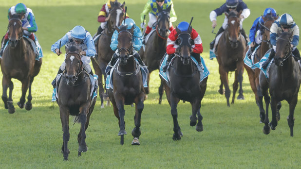 Damien Oliver broke the all-time Australian riding record with his 127th group 1 win when Nimalee (second from left) won the Queen of the Turf at Royal Randwick.