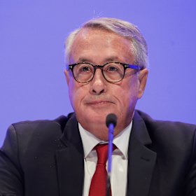 Wayne Swan was beamed into the conference from his hotel room.