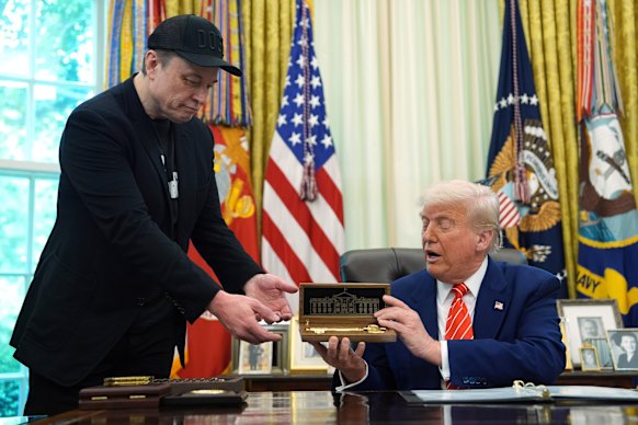 US President Donald Trump presents billionaire Tesla chief Elon Musk with a “golden key to the White House” as he leaves the administration.