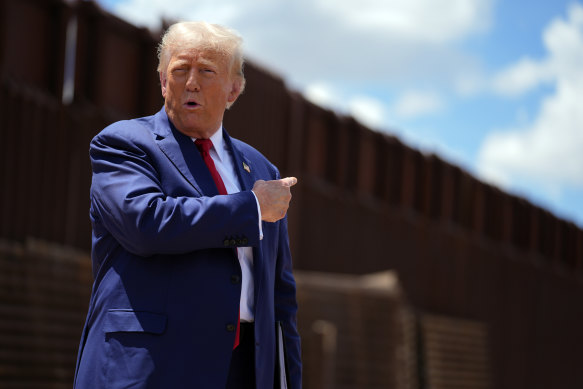 Donald Trump speaks on the southern border with Mexico in August. Only a fraction of his “beautiful wall” was built during his first term – and mainly to replace older dilapidated sections.