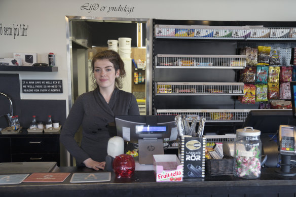 Margret Gudjonsdottir, 28, working alone at a roadstop in Hvammstangi, Iceland on April 30, as the country reopened. 