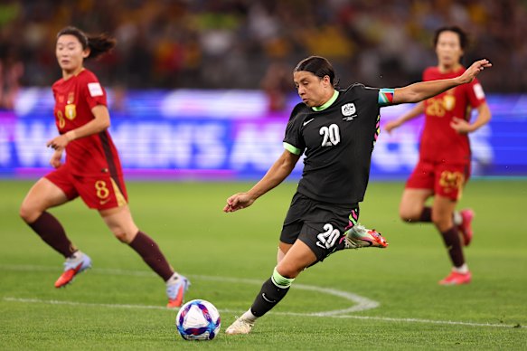 Kerr runs with the ball before scoring her second goal for the Matildas.