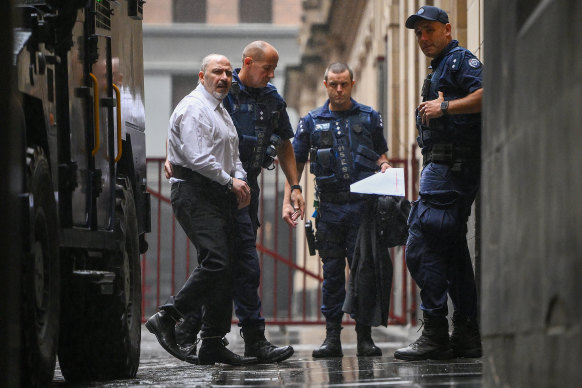 Tony Mokbel (left) arrives at the Supreme Court of Victoria in Melbourne.