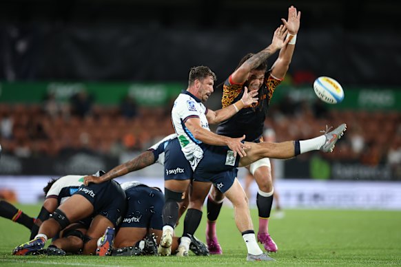 Jake Gordon clears the ball for the Waratahs.