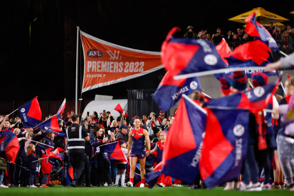 Kate Hore leads the Demons out for the opening game of the AFLW 2023 season.