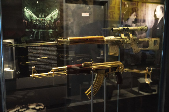 A gold AK-47 that belonged to Saddam Hussein along with an Iraqi sniper rifle is on display at the Central Intelligence Agency headquarters building’s refurbished museum.