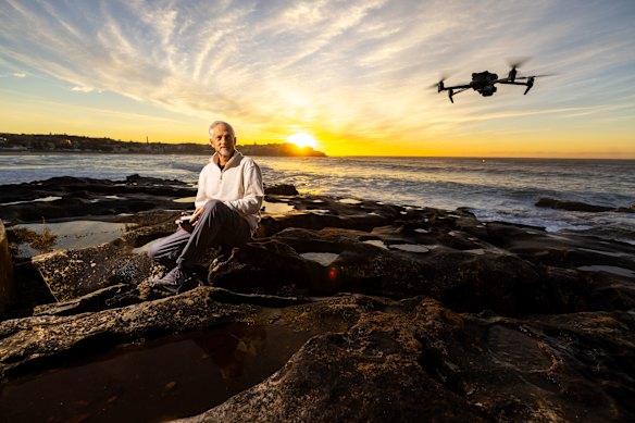 Jason Iggleden watches the beaches from drones most mornings.