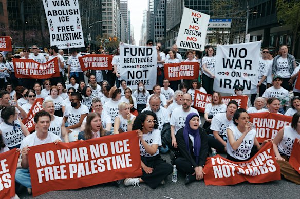 Demonstrators with Jewish Voice for Peace block traffic in Manhattan to protest the US-Israel war on Iran.