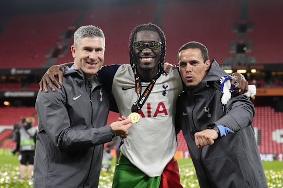 Nick Montgomery (left) and Sergio Raimundo (right) with Yves Bissouma (centre) after Tottenham’s Europa League win.