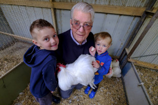 Chicken and egg situation: Hunter and Blair Vaughan are tutored by great-grandpa Alf Woods.