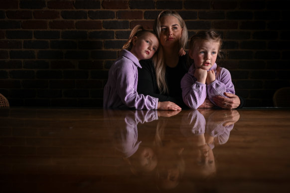 Joanna McNeill and her daughters Matilda, 8, and Charlee, 6. Joanna contracted silicosis after working in admin at a quarry.