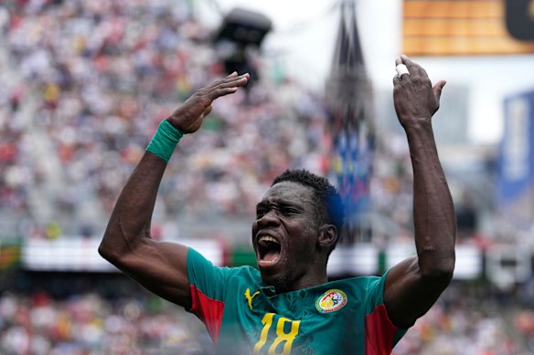 Ismaila Sarr celebrates scoring Senegal's second goal of the match.