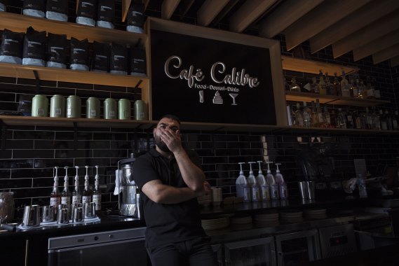 “I’m trying every way I can to stay in business.“: Messi Sahow, owner of Cafe Calibre near the Arlington light rail stop.