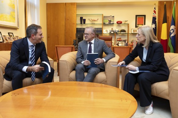 Treasurer Jim Chalmers, Prime Minister Anthony Albanese and Finance Minister Katy Gallagher with budget documents yesterday.