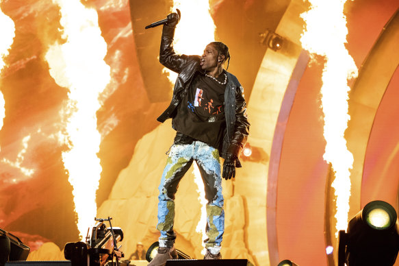 Travis Scott performs at his Astroworld Music Festival, Houston, where authorities are now investigating how eight people in the crowd were crushed to death.