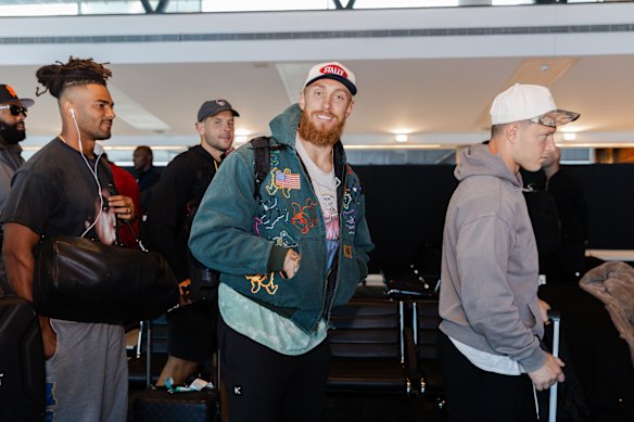 The 49ers looked in good spirits on their arrival at Tullamarine.