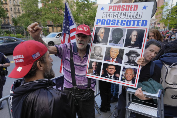 Donald Trump’s supporters make their feelings about the guilty verdict clear  outside Manhattan Criminal Court in New York on Thursday.