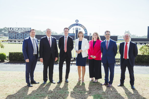 Premier Chris Minns announced the plan in December with a cast of ministers and ATC chairman Peter McGauran, second from left.