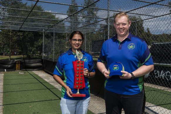 Manisha Shirodkar and Andrew Starks, the secretary and president of the Kingsgrove Cricket Club.