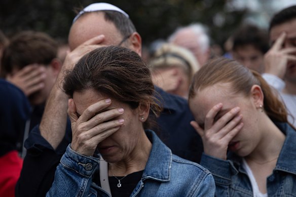 Mourners gather at Bondi after the shootings on December 14.